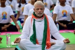 Narendra Modi, Amit Shah, narendra modi leads international yoga day in lucknow, Naval dockyard