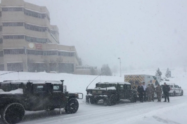 National Guard escort toddler through snowstorm for medical emergency