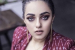 Jayalalithaa life, Jayalalithaa's journey, nithya menen stuns movie buffs with jayalalithaa s look in the iron lady, Jayalalithaa biopic